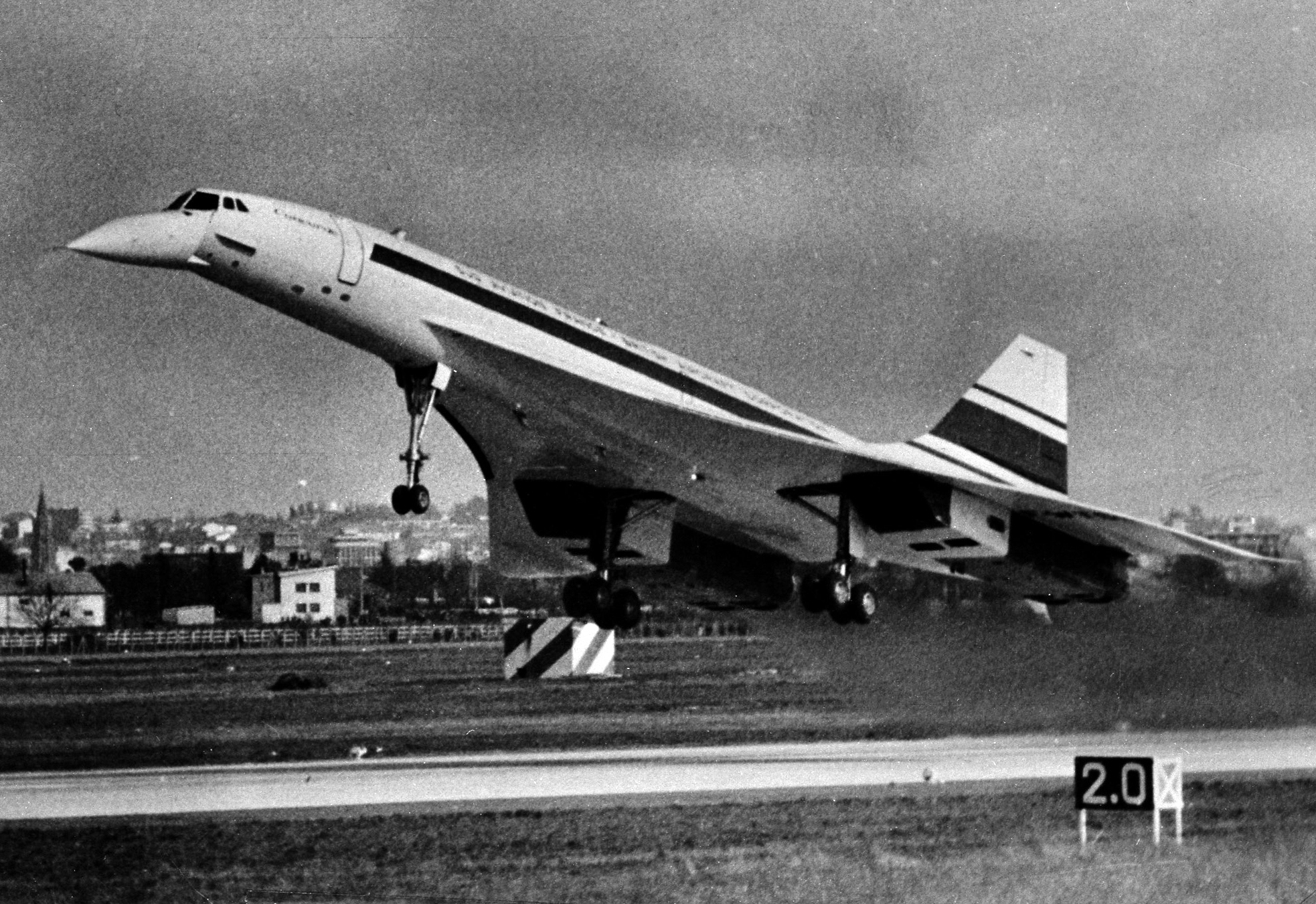 the first concorde prototype taking off from a runway

image taken in 1969