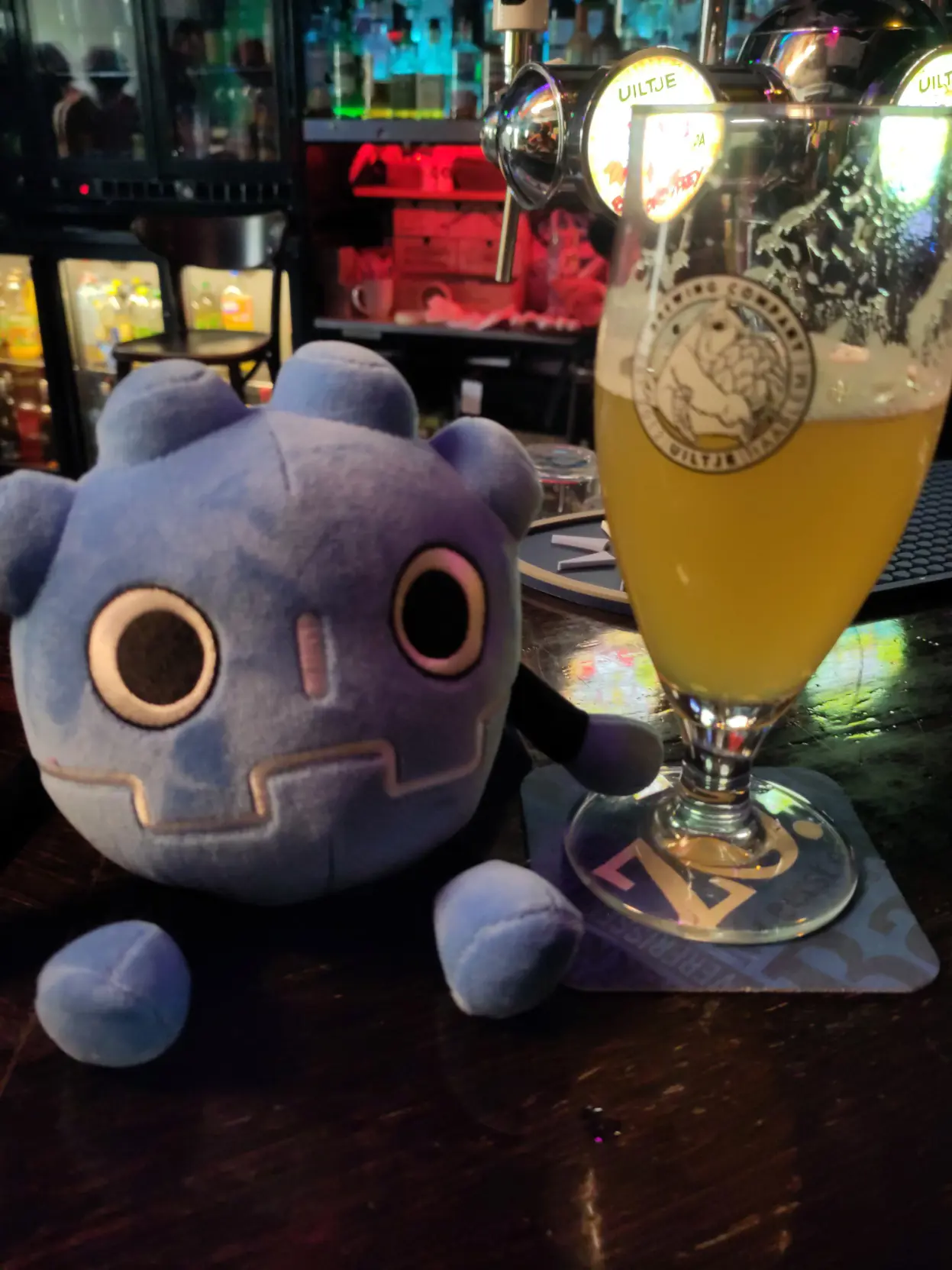 Godot plushy with a speciaal bier next to it.

The special bier is a "jucy lucy" by Uiltje in an uitje glass.