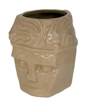 a mug designed to look like maurice from ultrakill