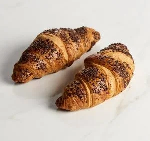 Chocolate and hazelnut filled viennoiserie with a chocolate topping