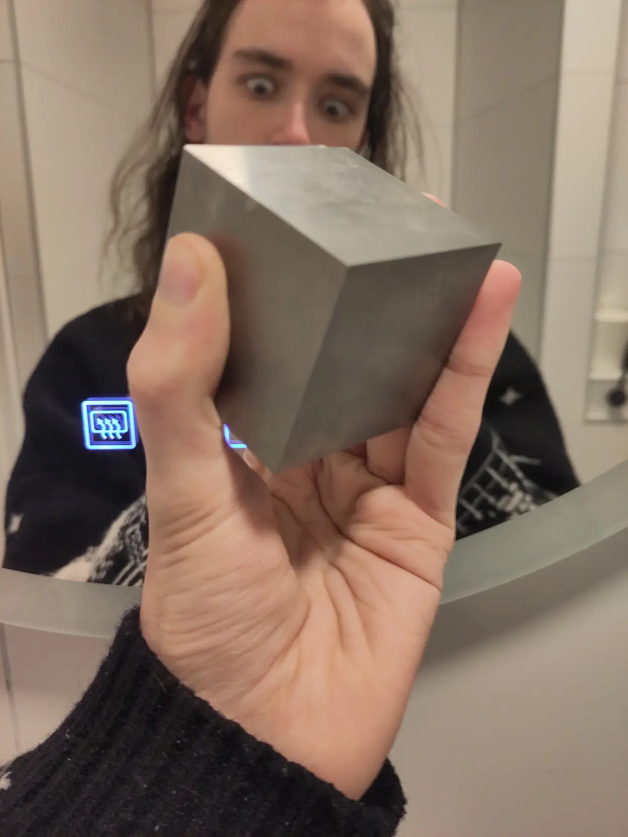 Me looking at a tungsten cube